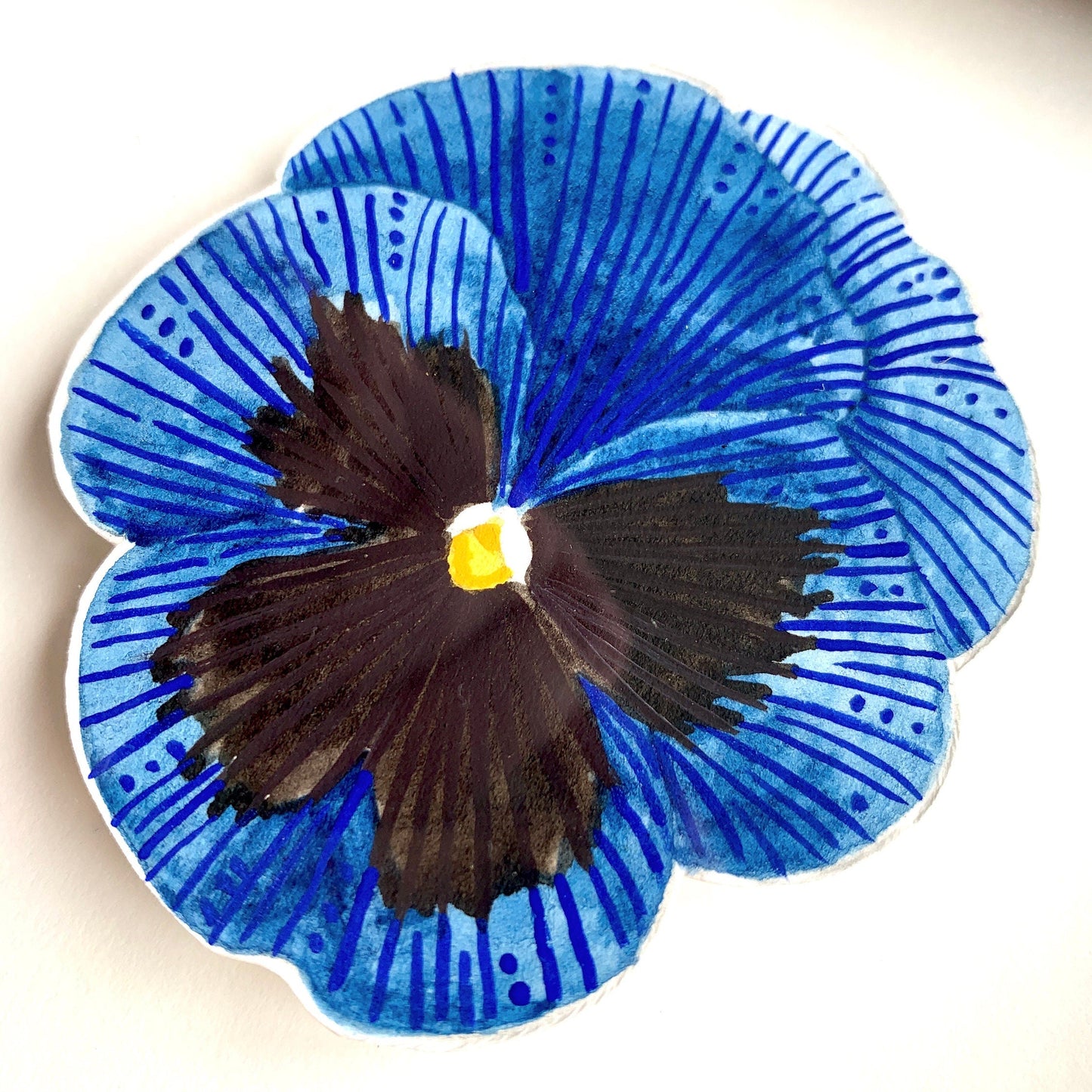 Blue and black pansy flower painting close up. showing the details and textures of the artwork.