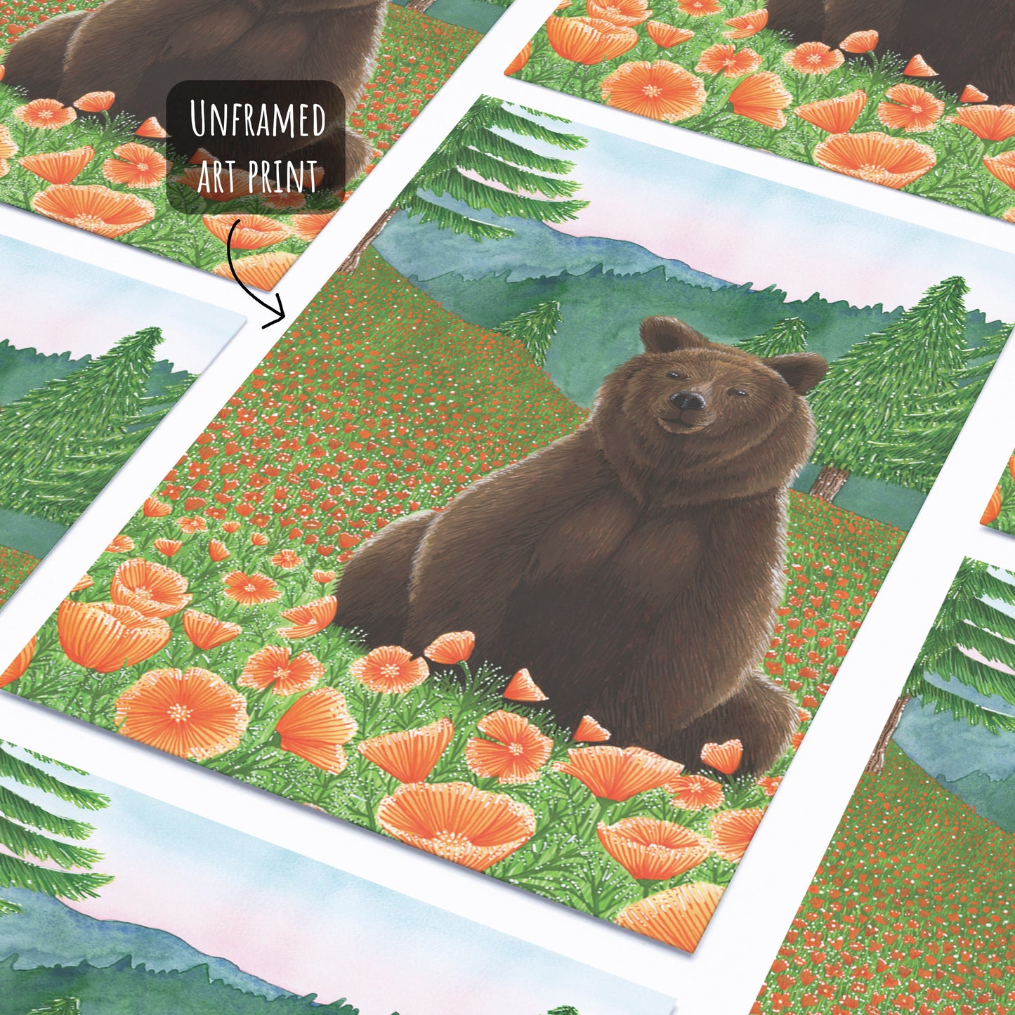 grizzly bear art print placed flat on a white surface.