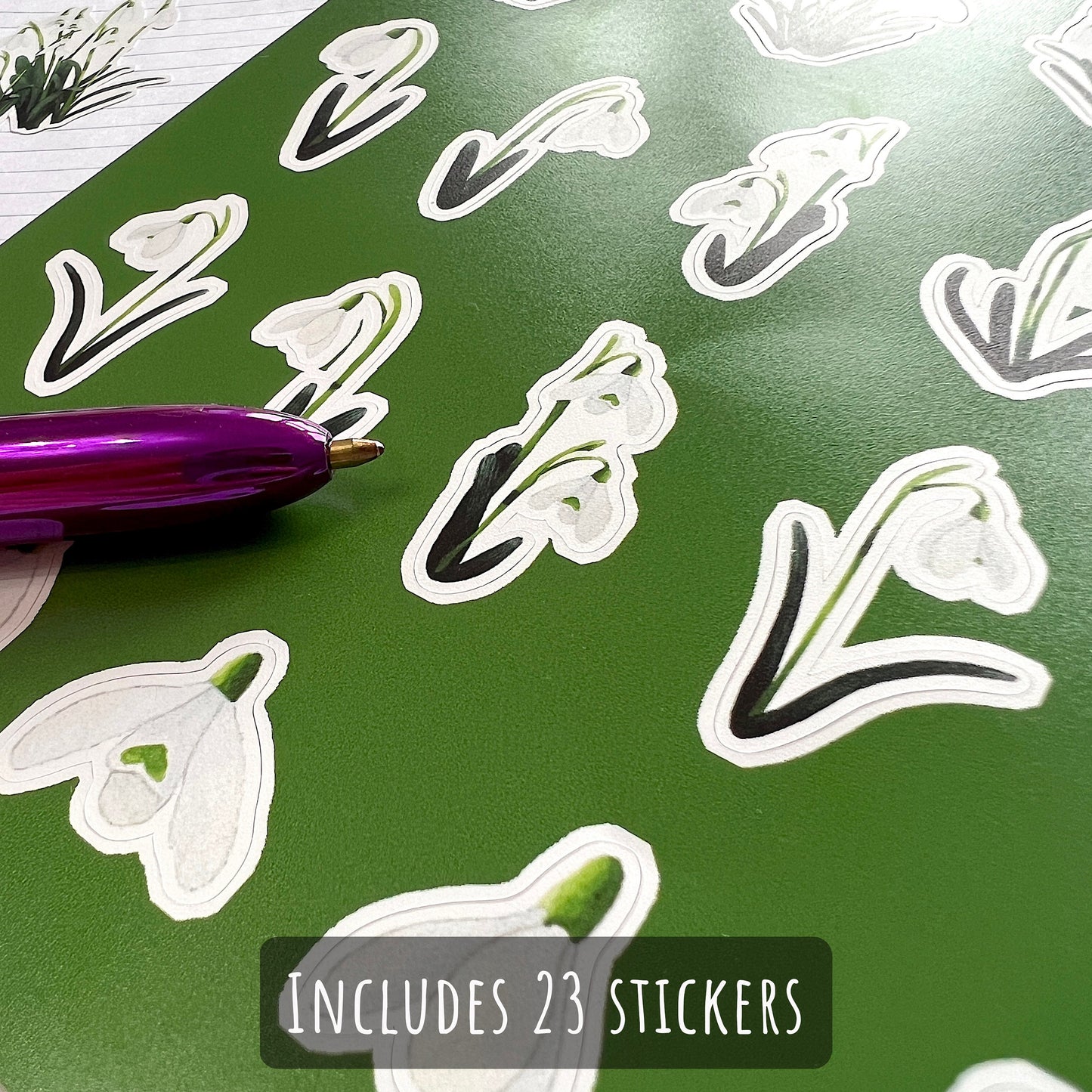 Snowdrop Flower Sticker Sheet close up showing the details of the individual stickers with the text includes 23 stickers.