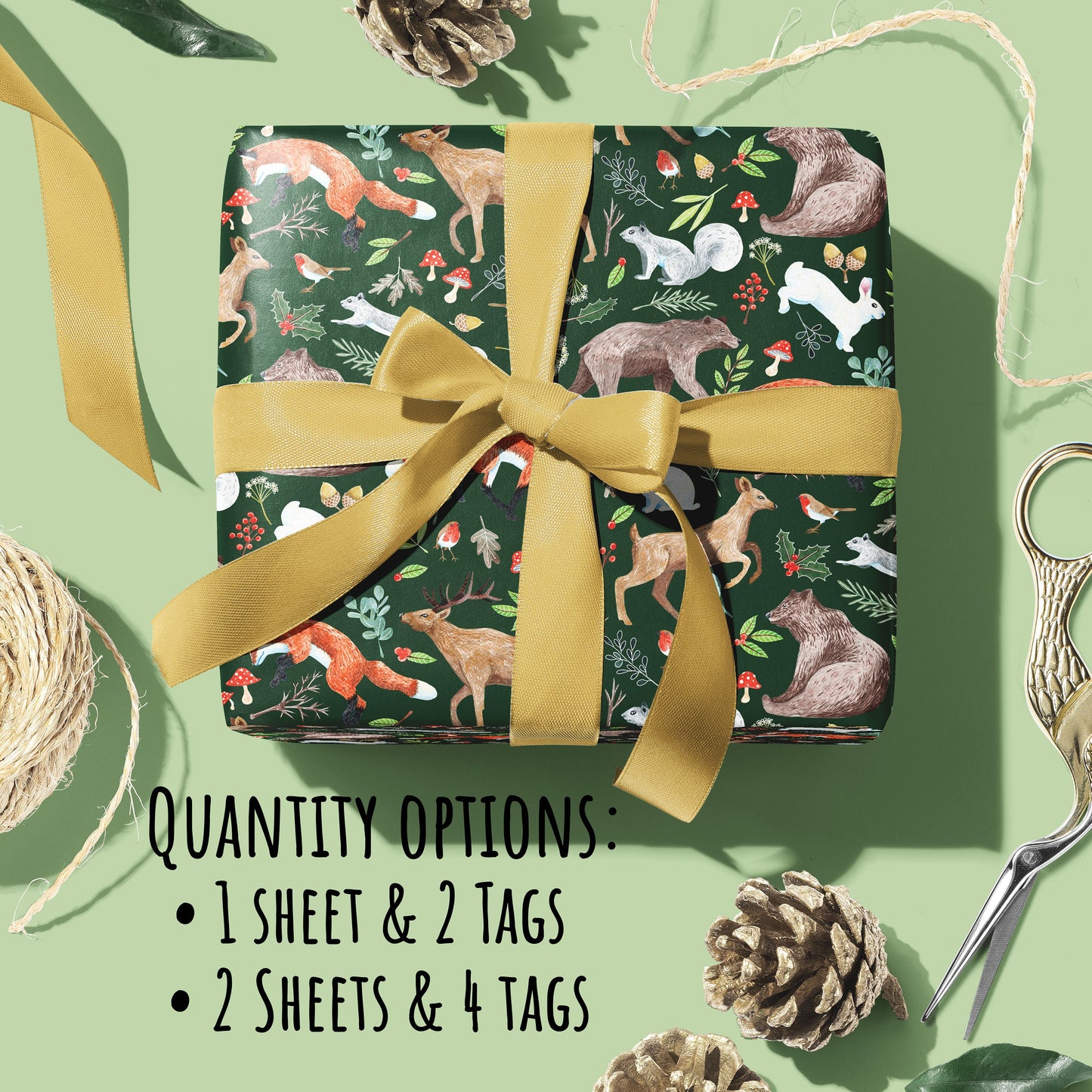 a parcel wrapped up in Woodland Christmas Wrapping Paper with a gold ribbon bow on a green background. with the text quantity options: 1 sheet & 2 tags, 2 sheets & 4 tags.