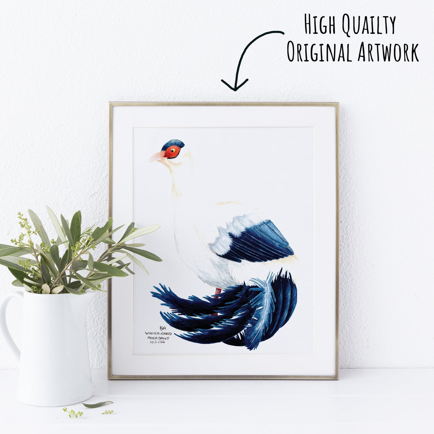 Framed artwork of a whited eared pheasant bird with a plant on a white surface