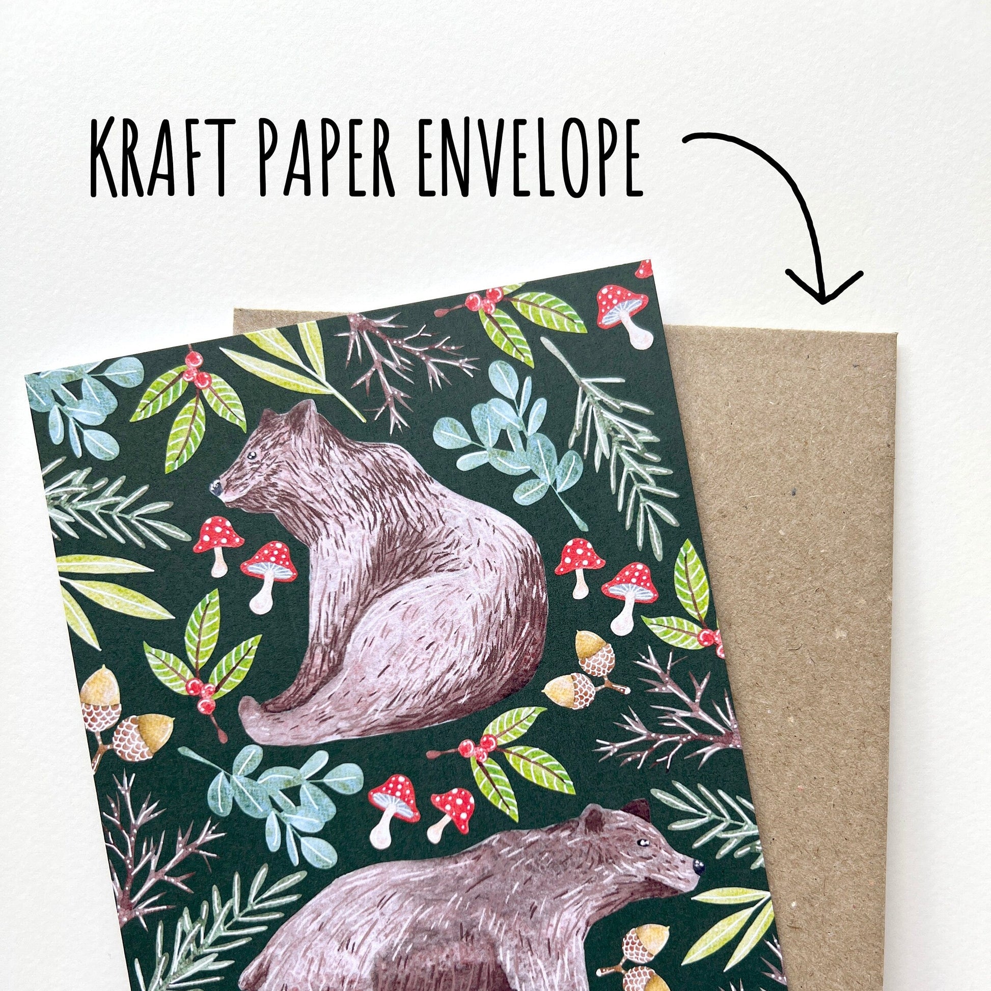 showing the Woodland Bear Christmas Card with a kraft paper envelope on a white background with the font Kraft paper envelope.