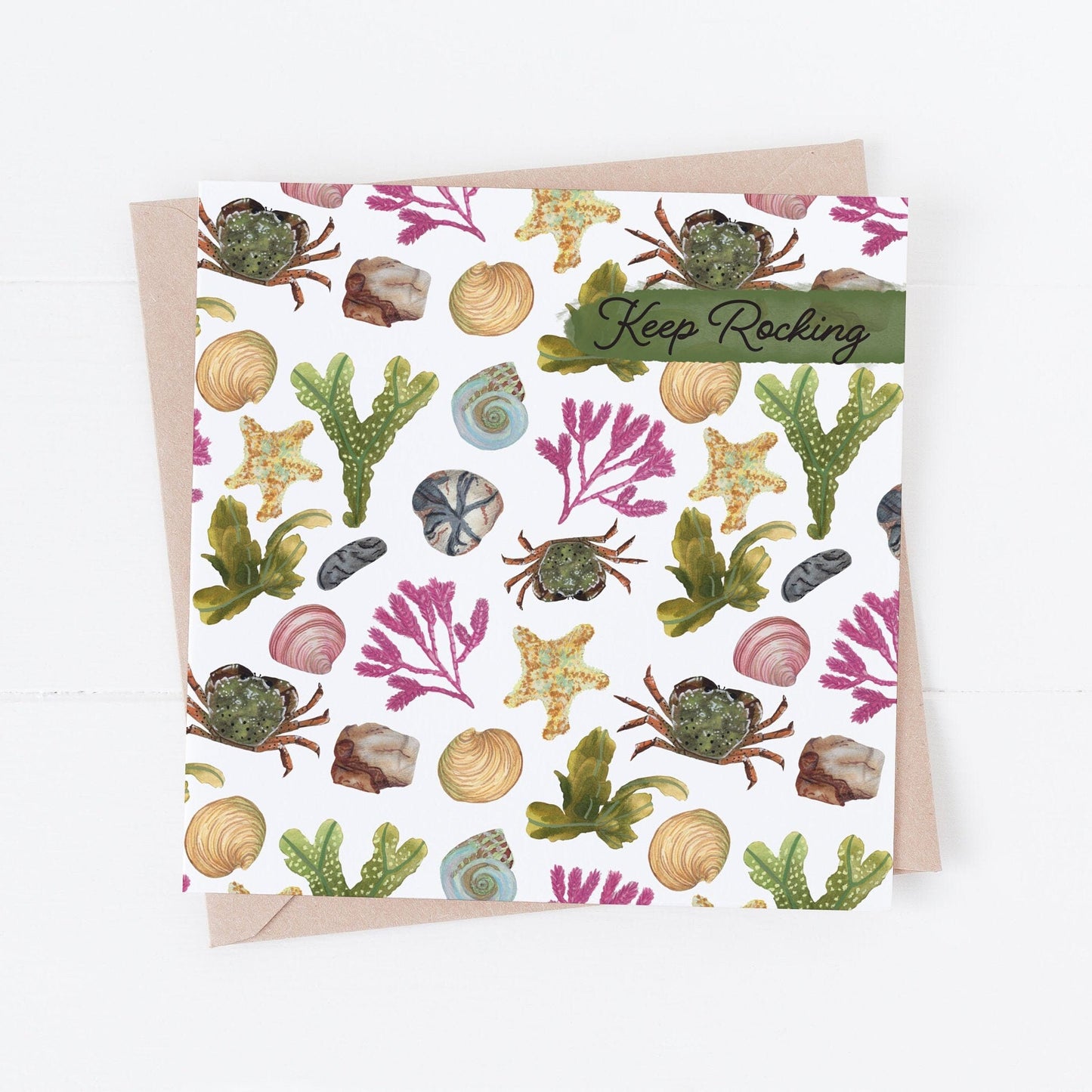 Greeting card with sea-themed design and 'Keep Rocking' text on a white background