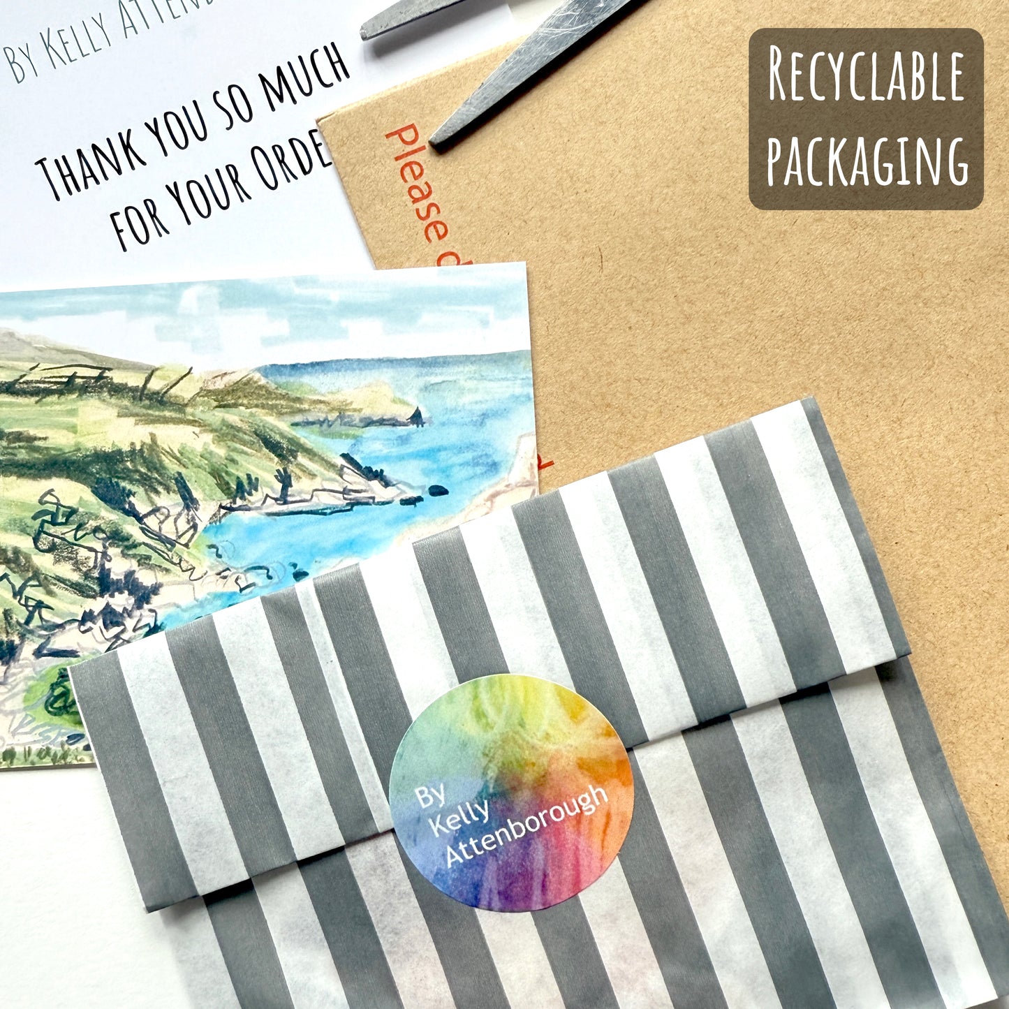 Showing how your sticker will be packaged. Placed in a striped paper sleeve sealed with a brand logo sticker. Placed into a hard back envelope with a thank you card.