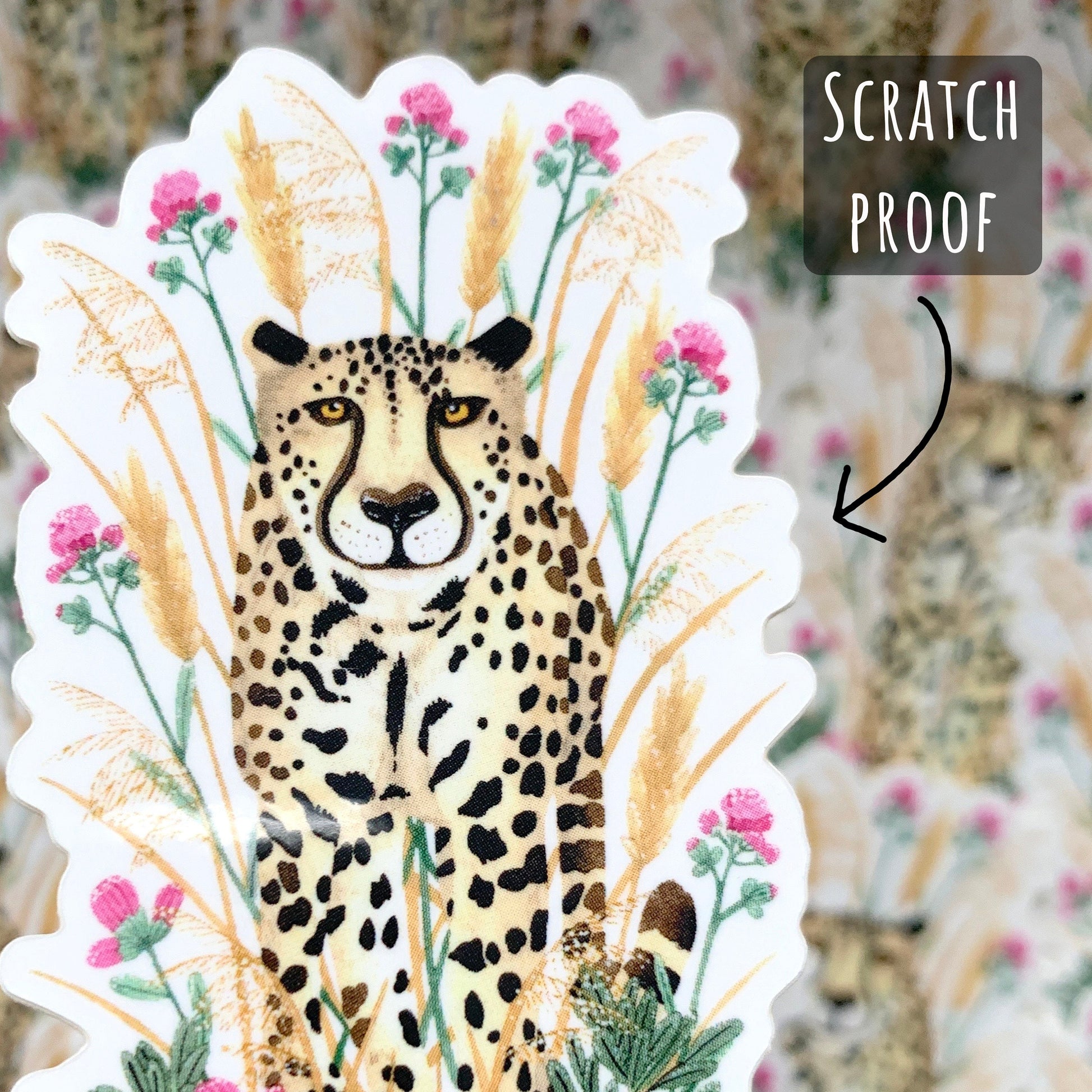 Cheetah Sticker close up showing the details of the sticker with the text scratch proof.