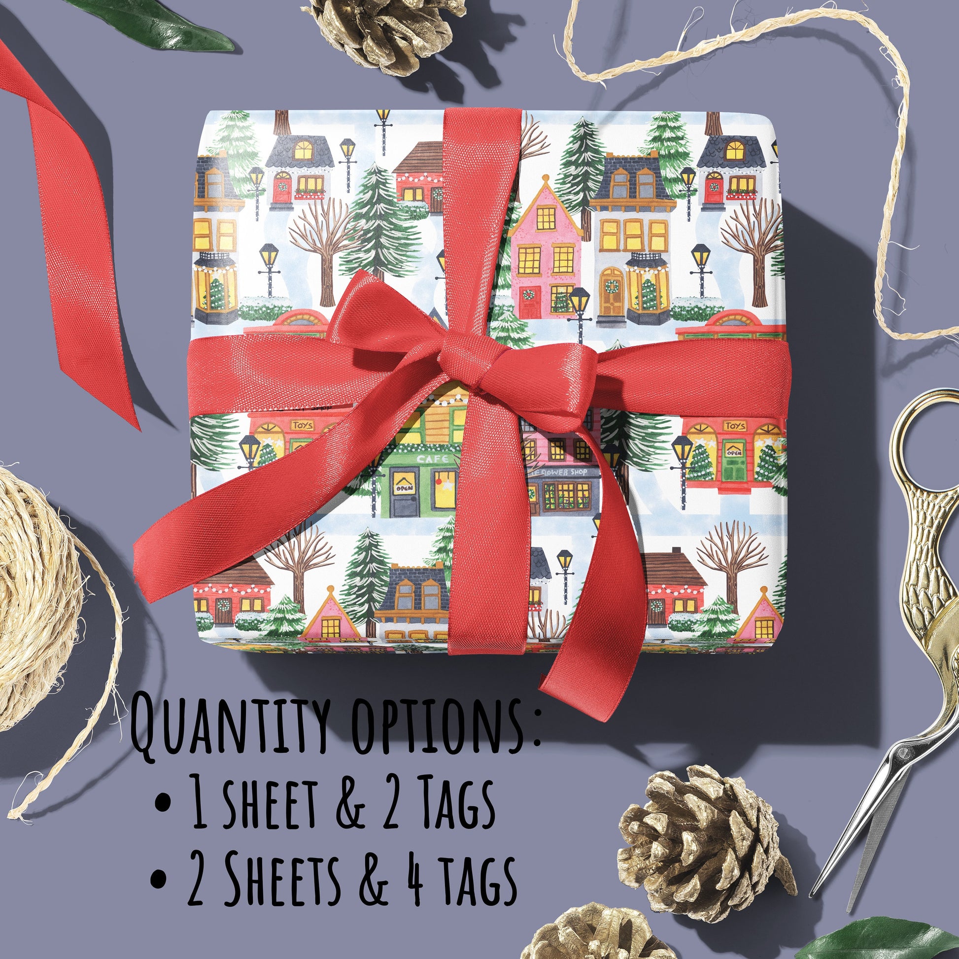 Christmas Village Wrapping Paper wrapped around a parcel with a red ribbon bow on a purple surface, with the text Quantity options: 1 sheet & 2 tags, 2 sheets & 4 Tags.