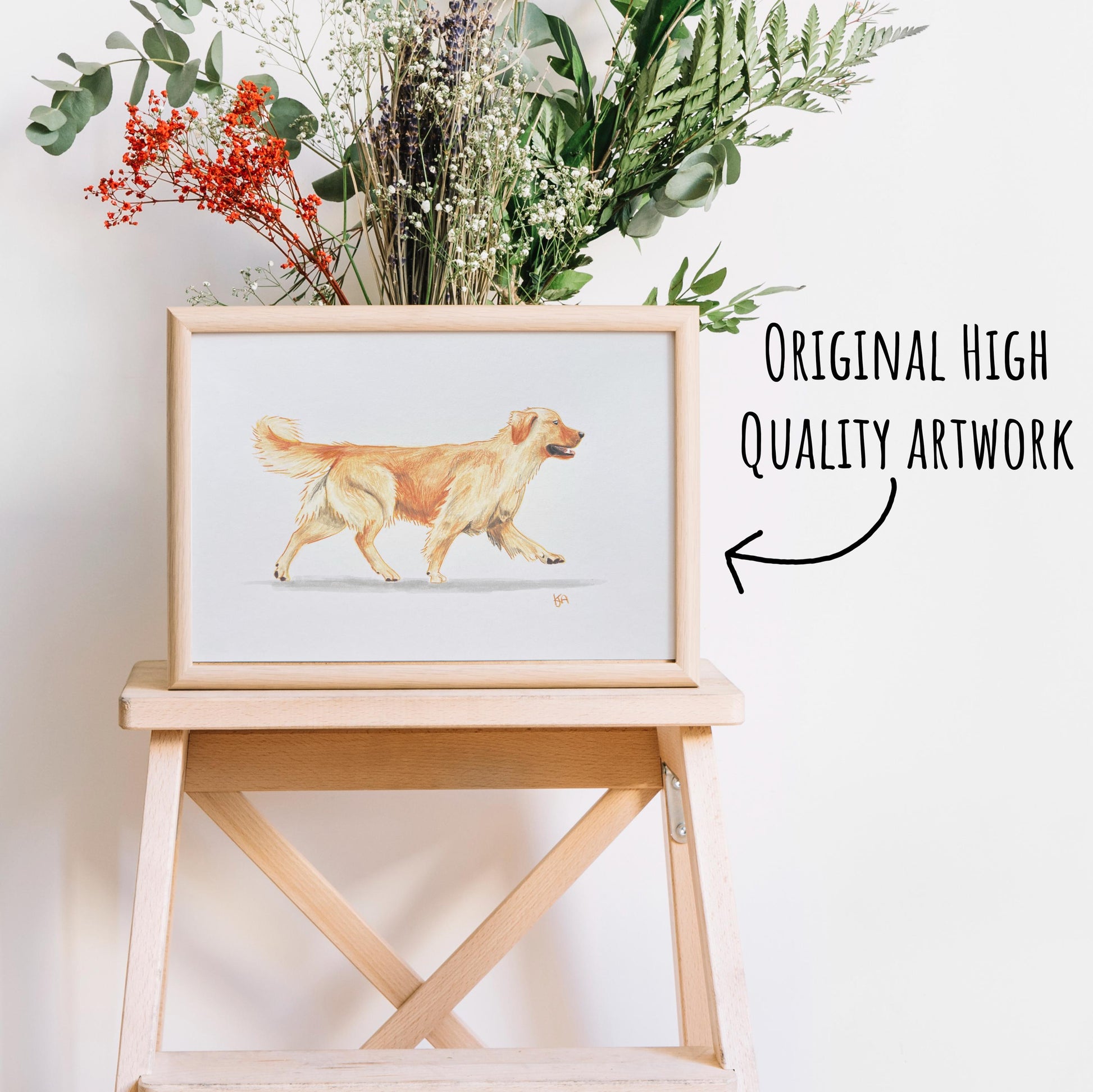 Original artwork of a golden retriever running on white background shown in a light pine wood frame (frame not included)