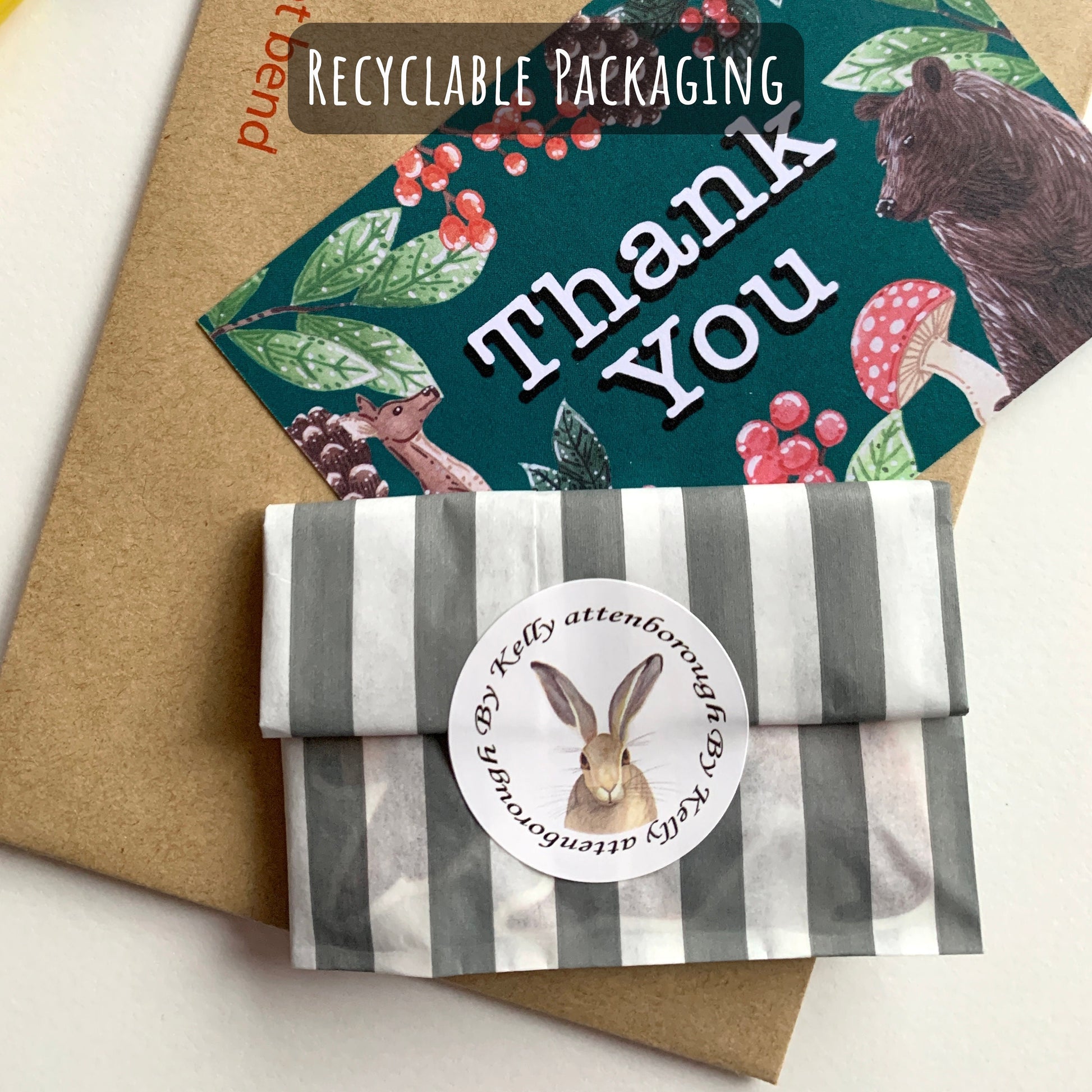 showing how your sticker will be packed. Placed into a paper sleeve, then placed into a hard backed envelope with a thank you card.