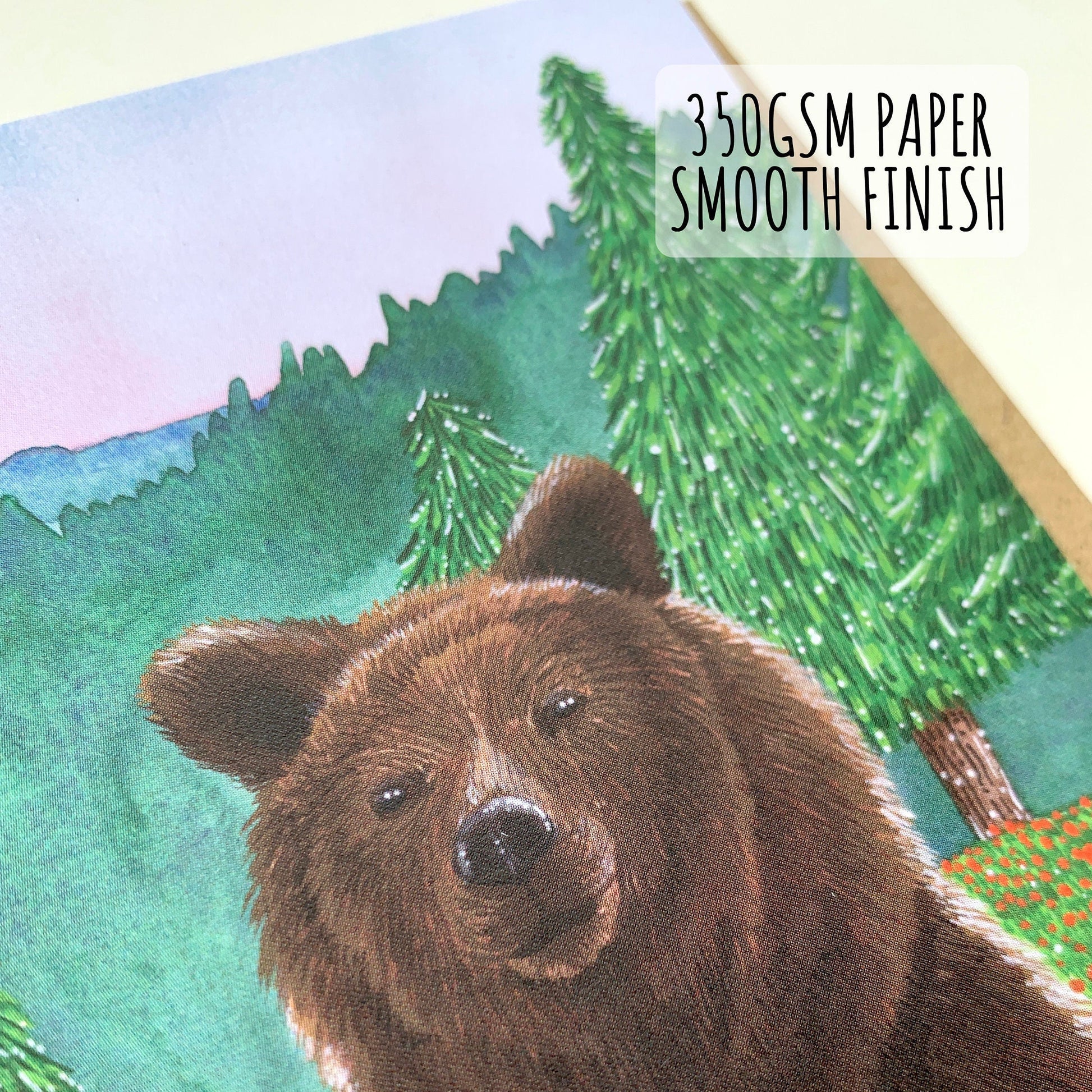 Grizzly Brown Bear Birthday card close up showing the details and textures of the illustration and paper stock. with text 350gsm paper smooth finish.