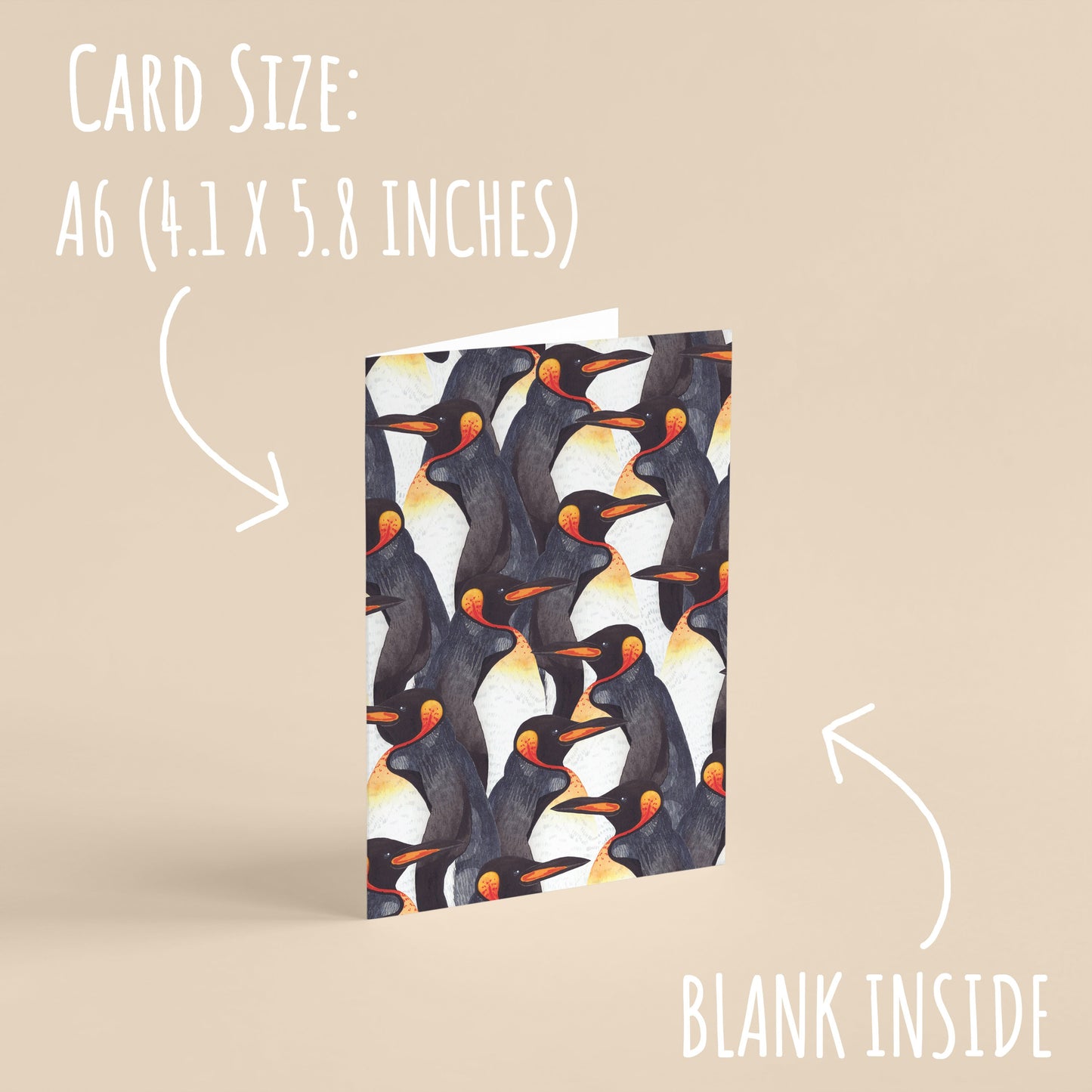 One of the King Penguin Watercolour Note Cards standing upright with a pale orange background with the text card size: A6 (4.1 x 5.8 inches) and blank inside.