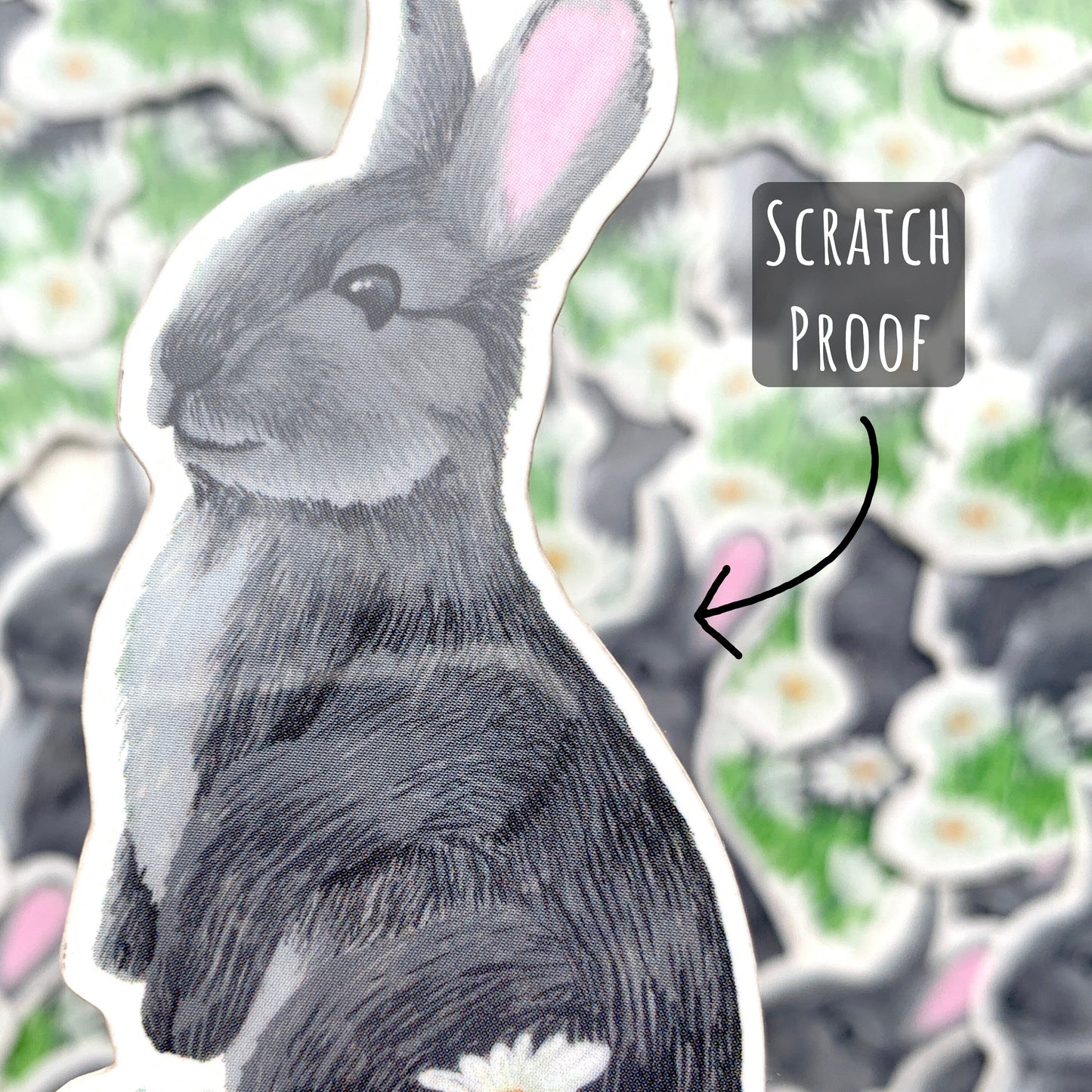 Little Wild Rabbit and Daisies Sticker close up showing the details of the illustration with the text scratch proof.