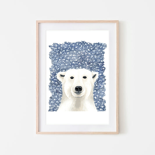 A framed art print of a white polar bear on a dark blue snowy background, with a white border around the illustration.