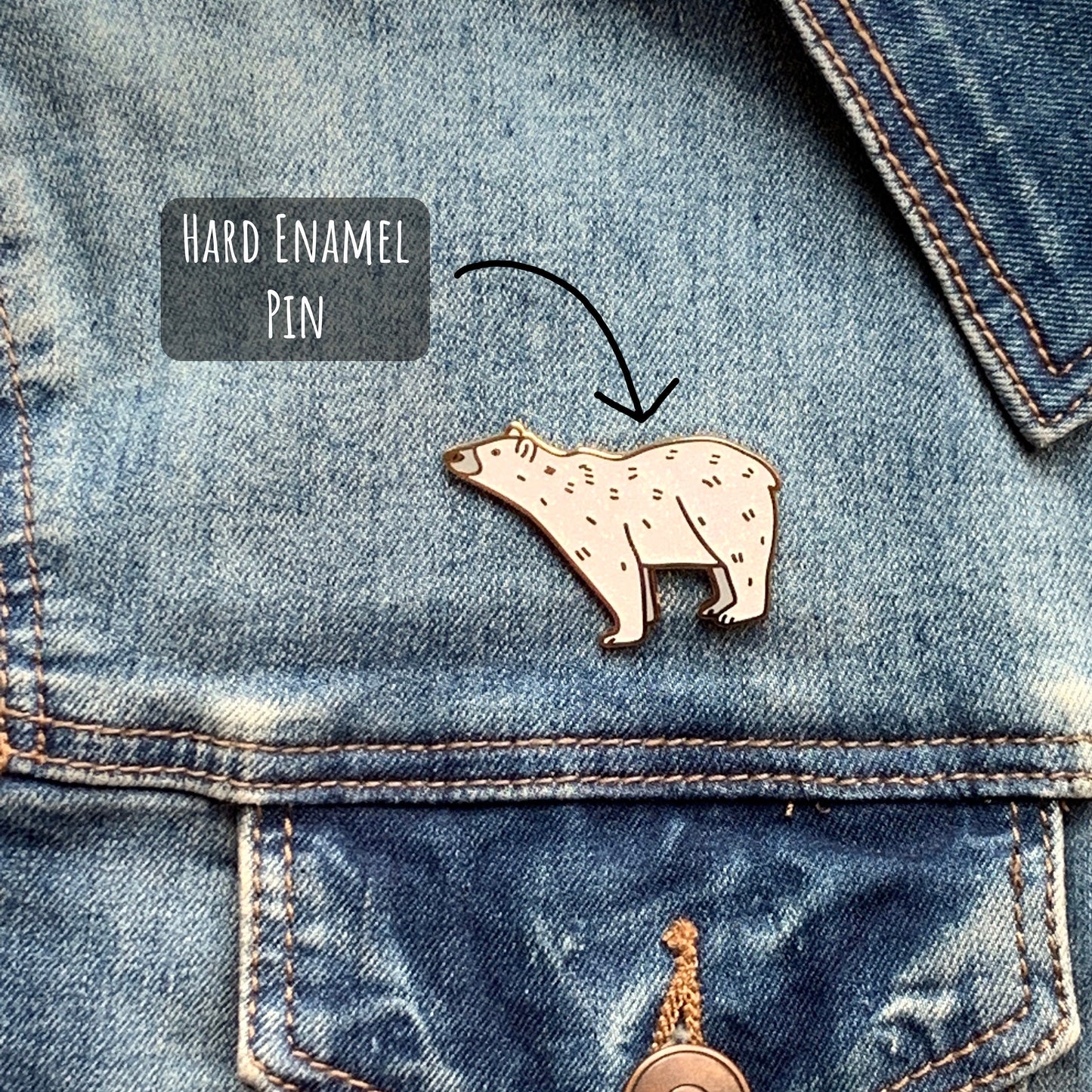 Polar Bear Enamel Pin badge pinned to a blue denim jacket with the text hard enamel pin.