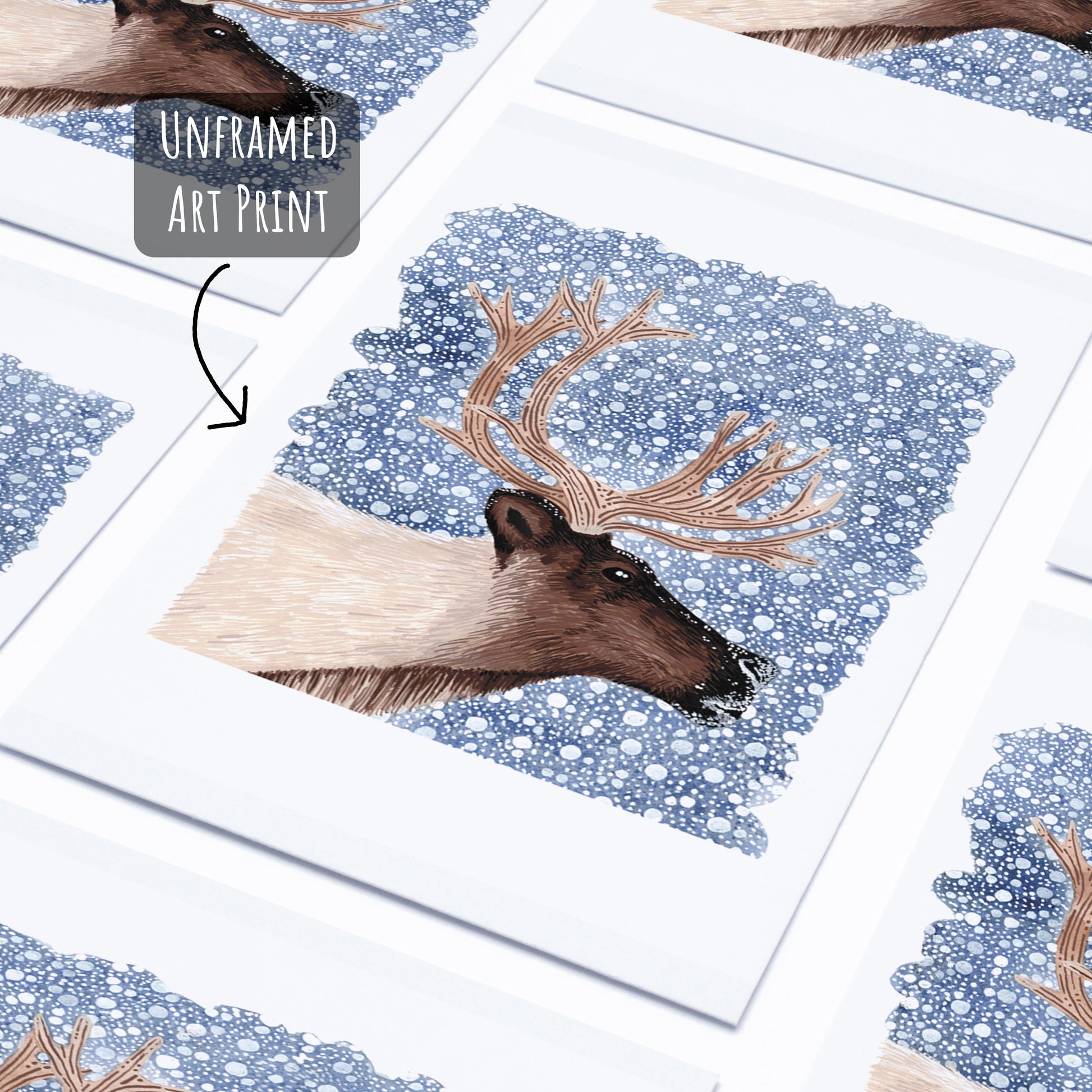 A reindeer art print in a dark blue snowy background on a white surface. unframed