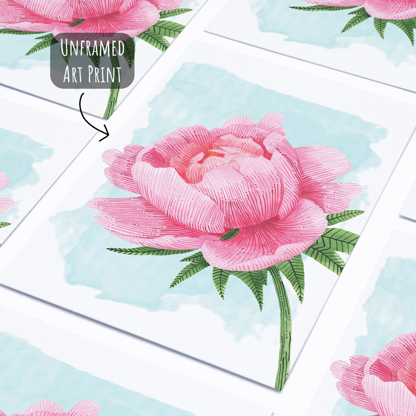 Pink peony art print laying flat on a white surface with no frame.