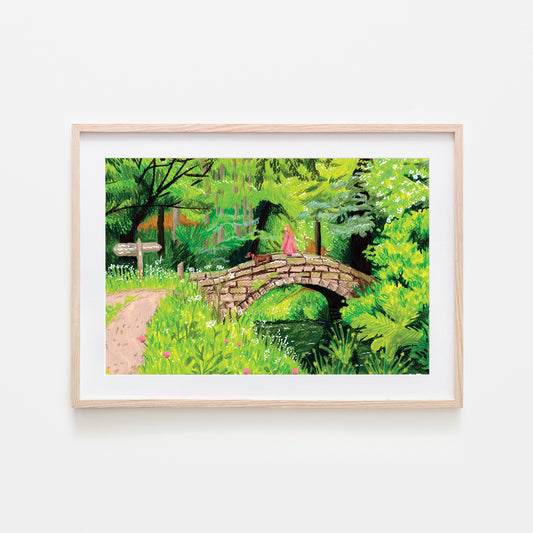 A vibrant green art print of a footbridge in a woodland, with trees and foliage on high quality Tintoretto gesso paper.