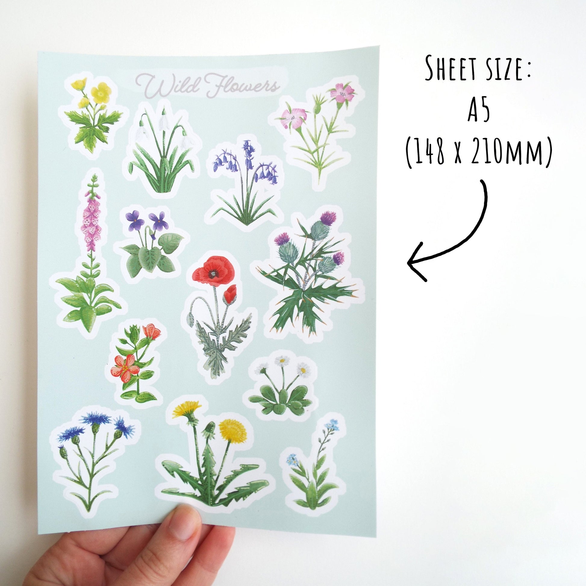 Watercolour Wildflower Sticker Sheet held up on a white background with the text: sheet size: A% (148 x 210mm).
