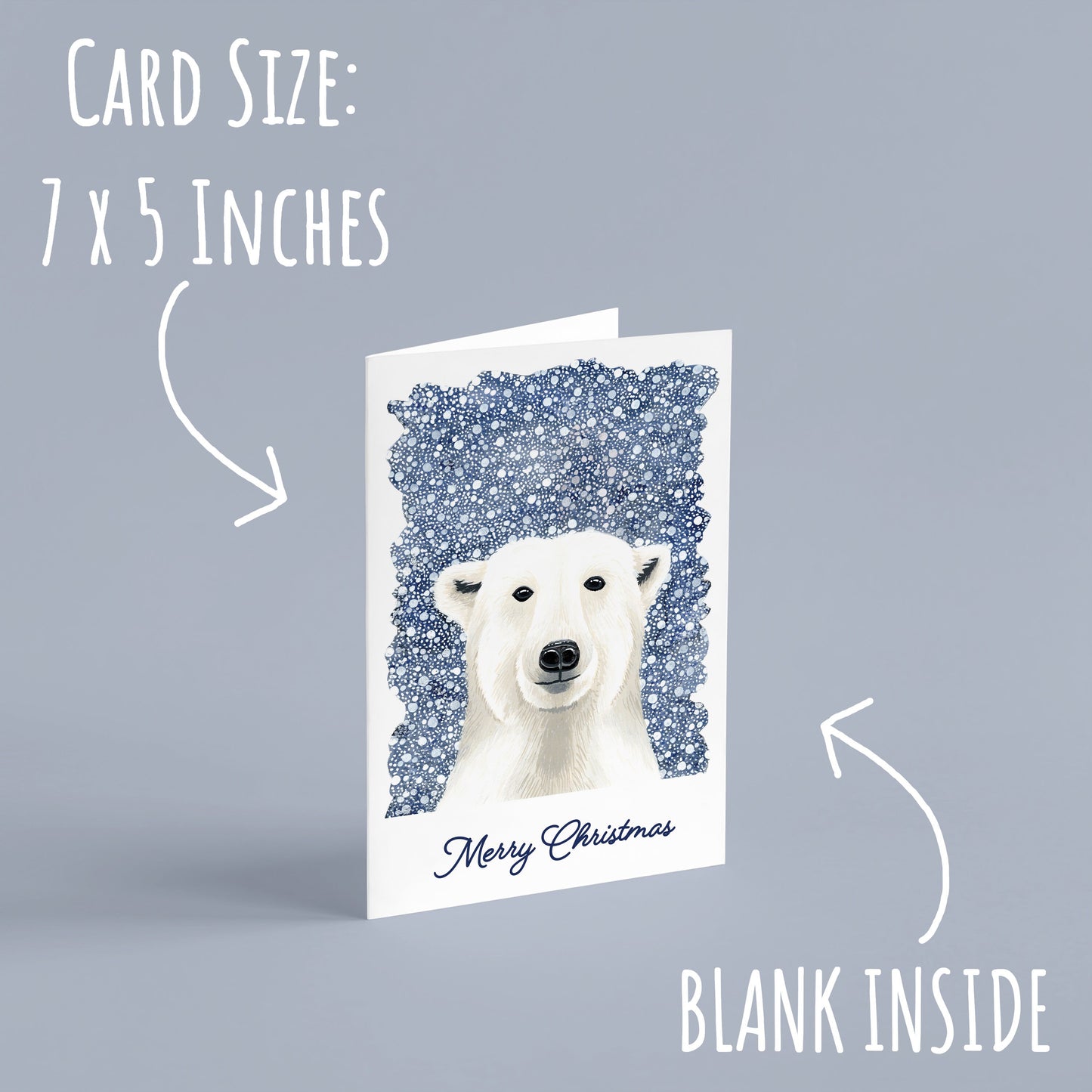 White Polar Bear Christmas Card standing up right on a pale blue background with the text card size: 7 x 5 inches & Blank inside.