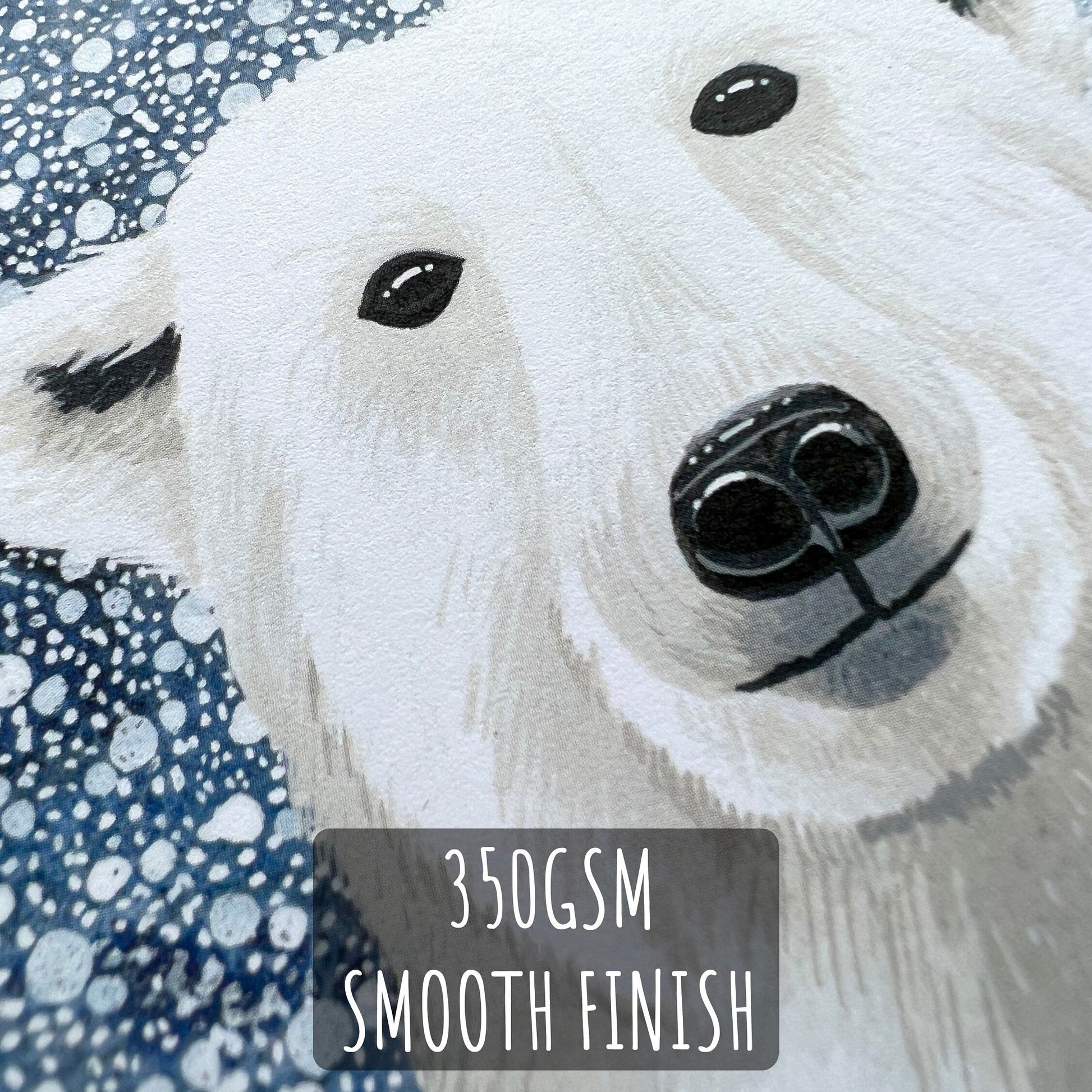 White Polar Bear Christmas Card close up showing the details and texture of the illustration and paper stocker. with the text 350gsm smooth finish.