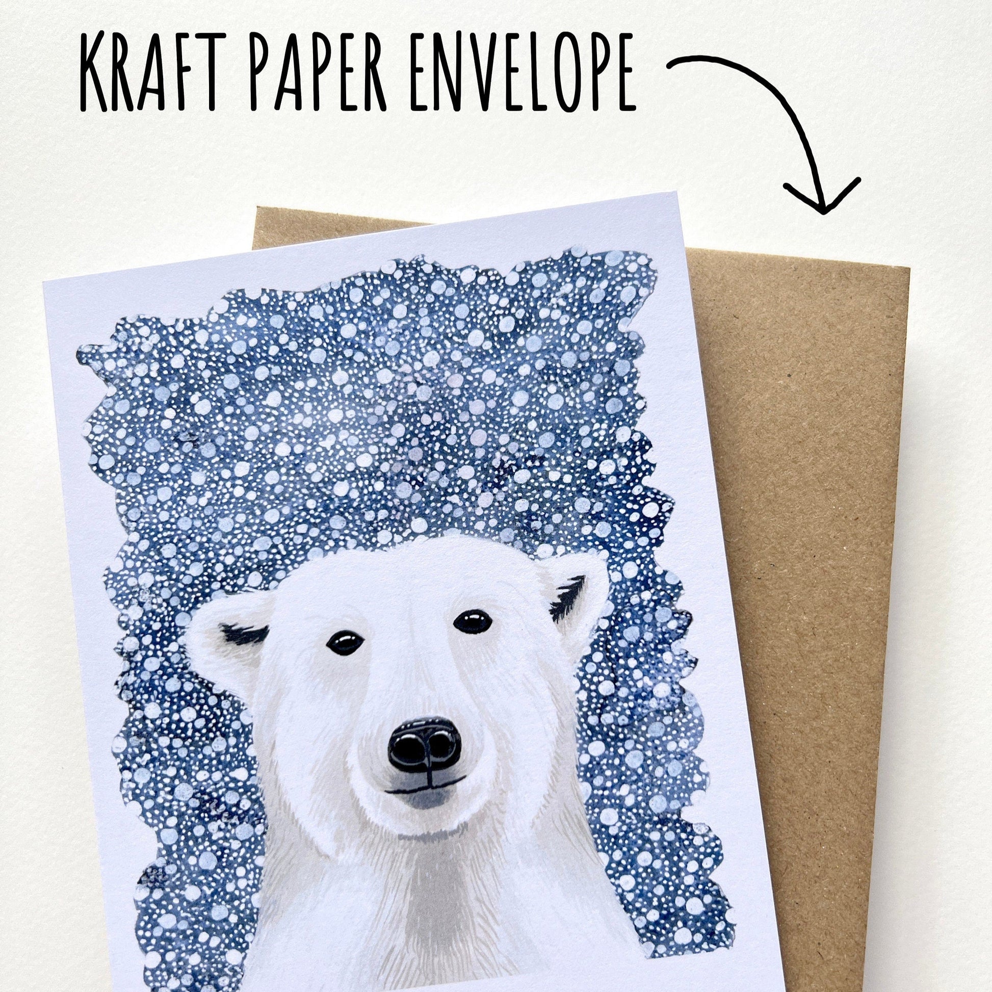 White Polar Bear Christmas Card with a kraft paper envelope with a white background. Text: kraft paper envelope.