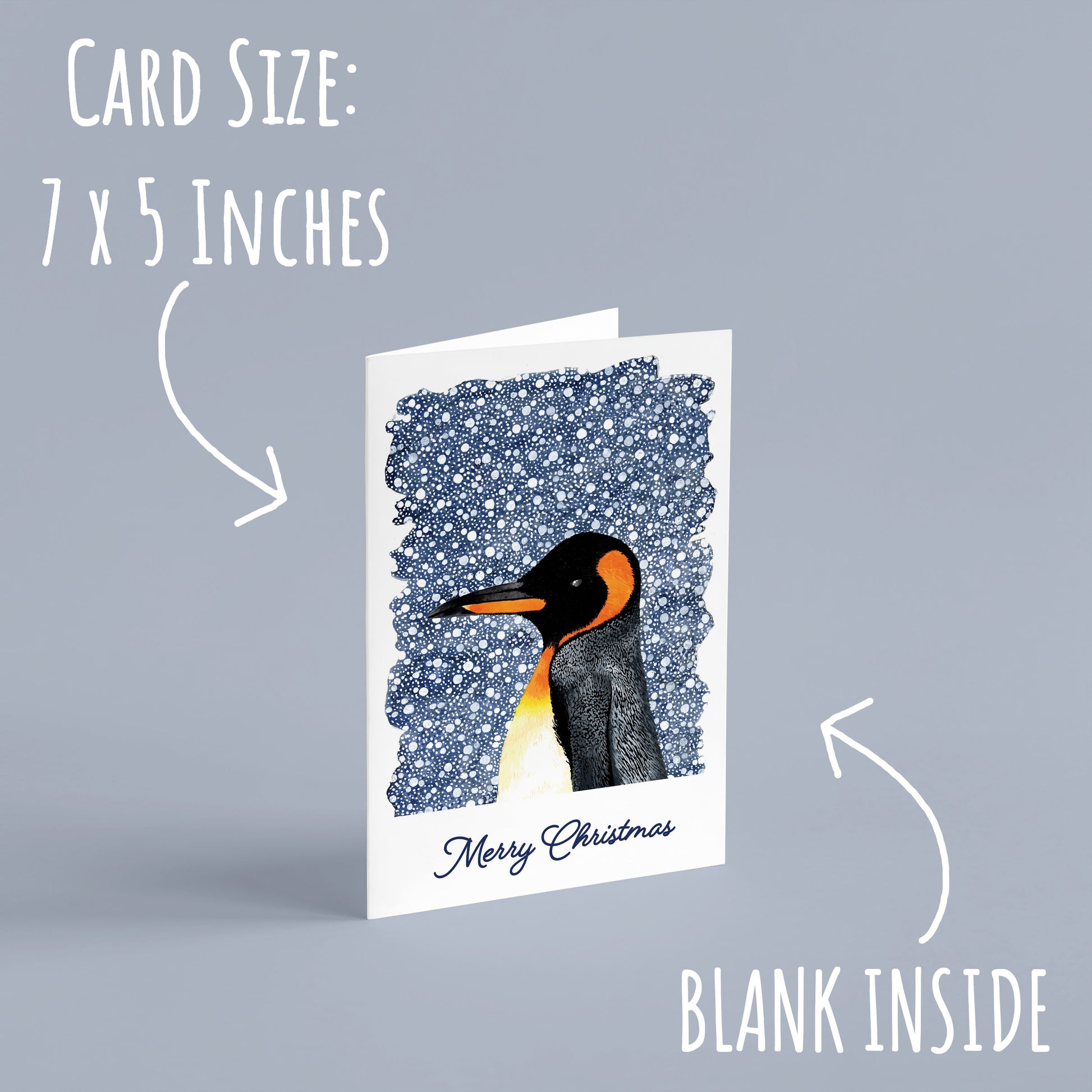 One of the Winter Animal Christmas Cards standing up right on a pale blue background with the text, card size: 7 x 5 inches & blank inside.
