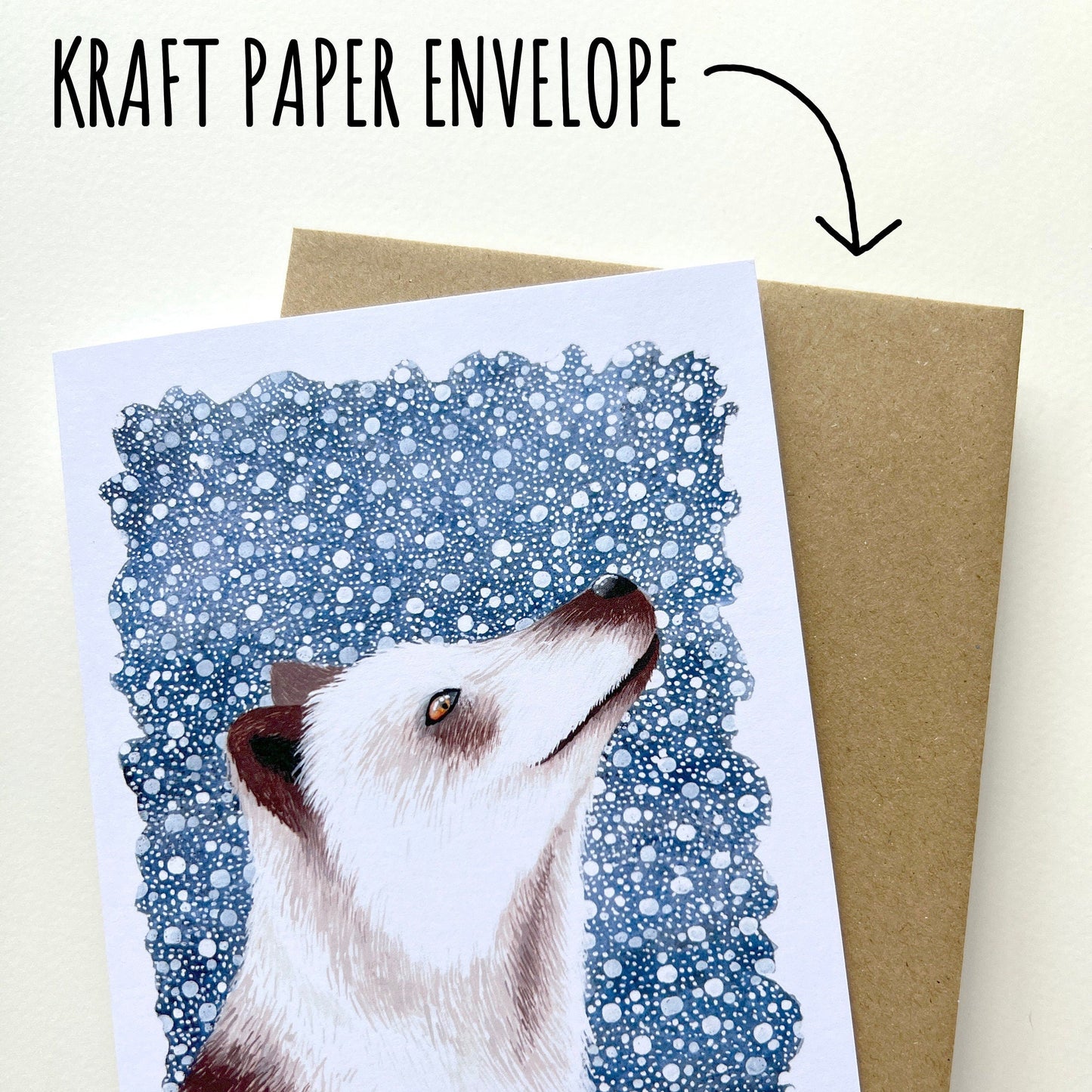 Greeting card with a fox illustration and a kraft paper envelope on a white background