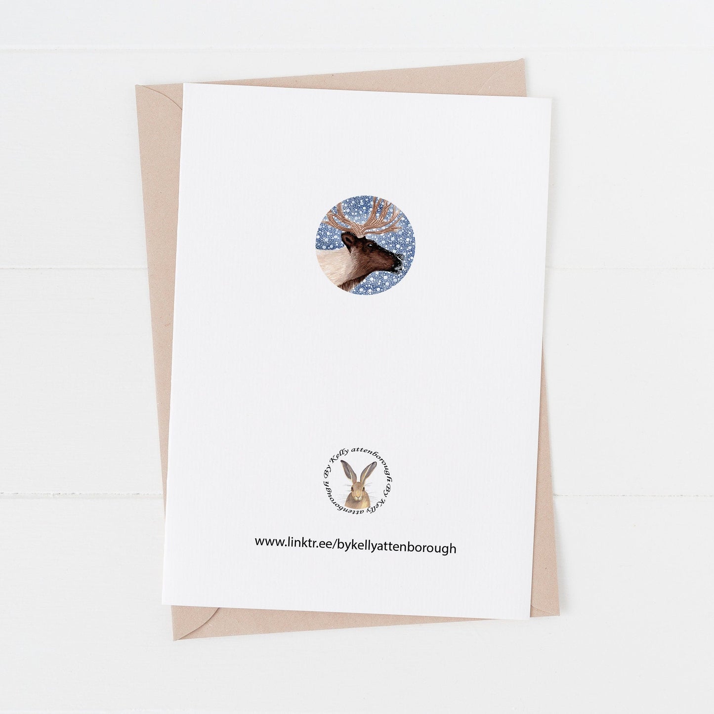 The back of a greeting card with a kraft paper envelope on a white background