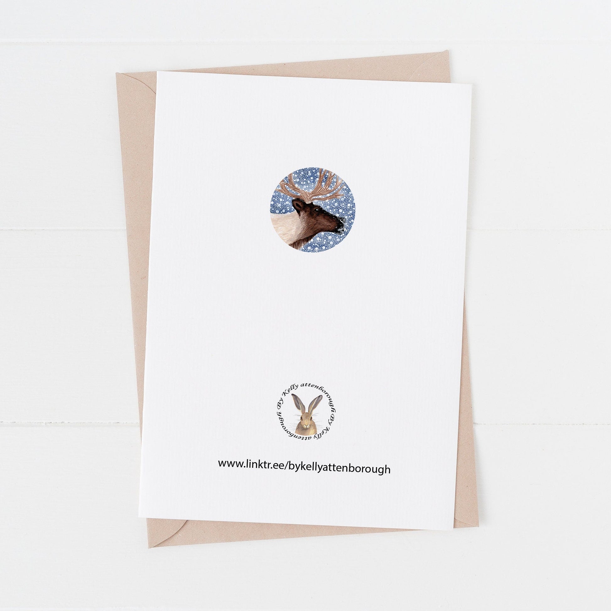 The back of a greeting card with a kraft paper envelope on a white background
