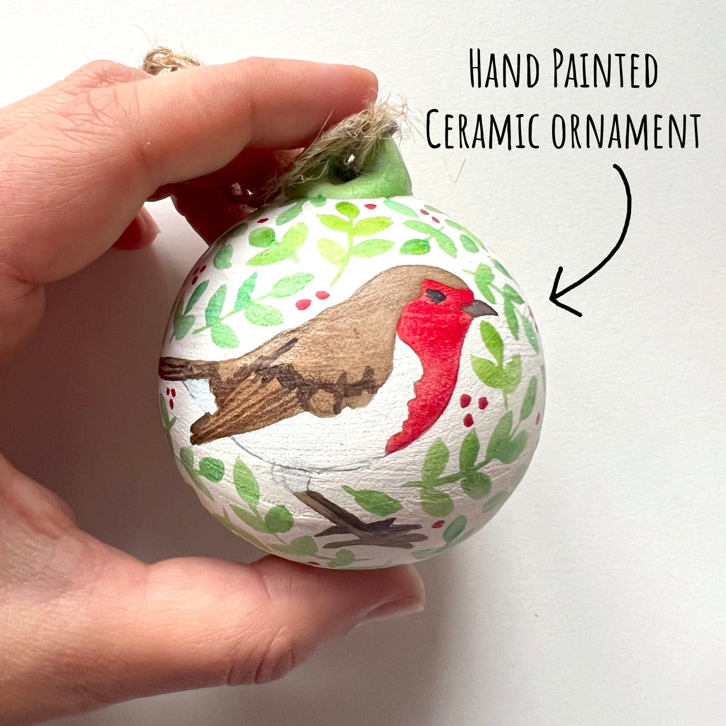 showing the robin of the Woodland Animals Ceramic Baubles on a white background with the text hand painted ceramic ornament.