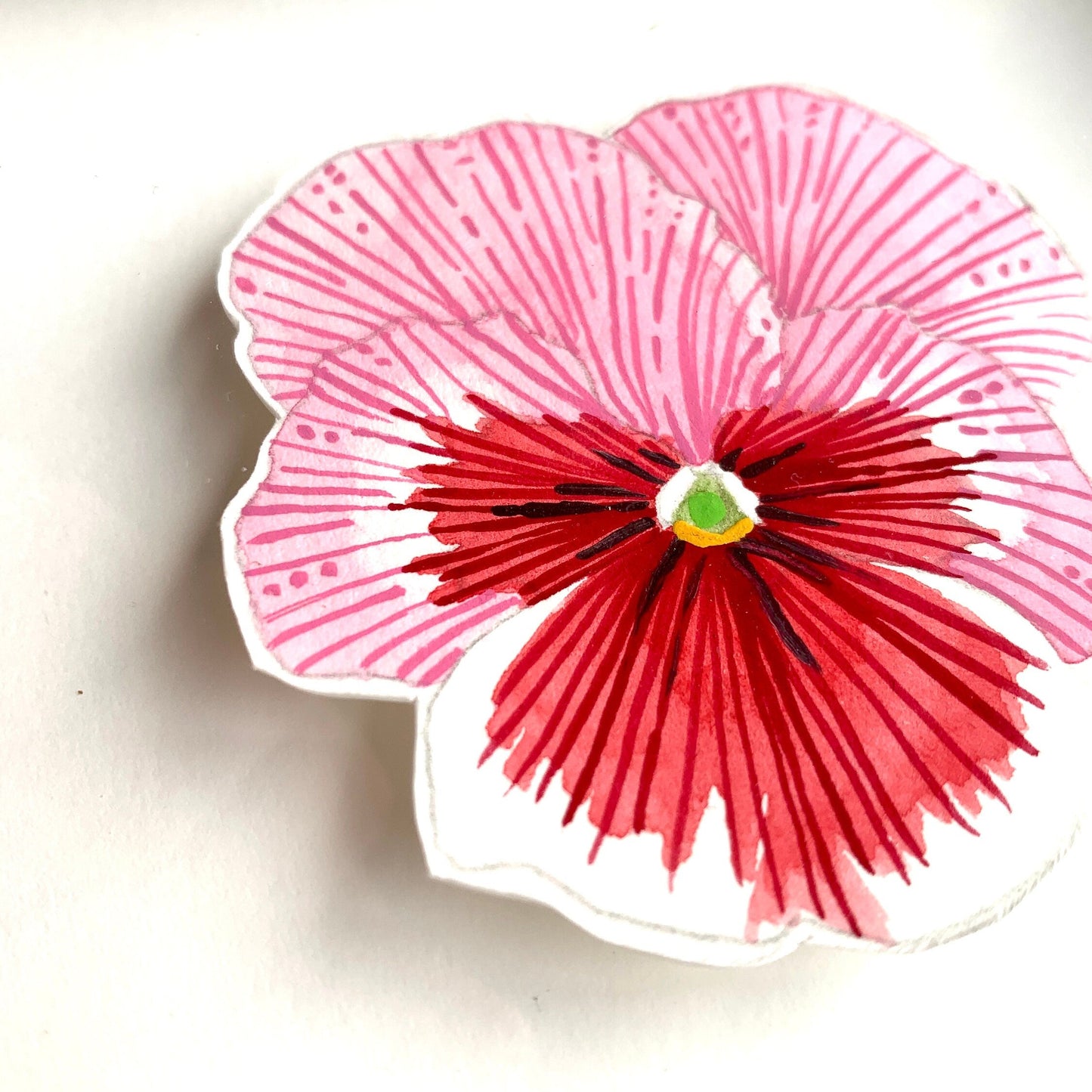 A pink, red and white pansy flower painting close up showing the line details and texture of the illustration